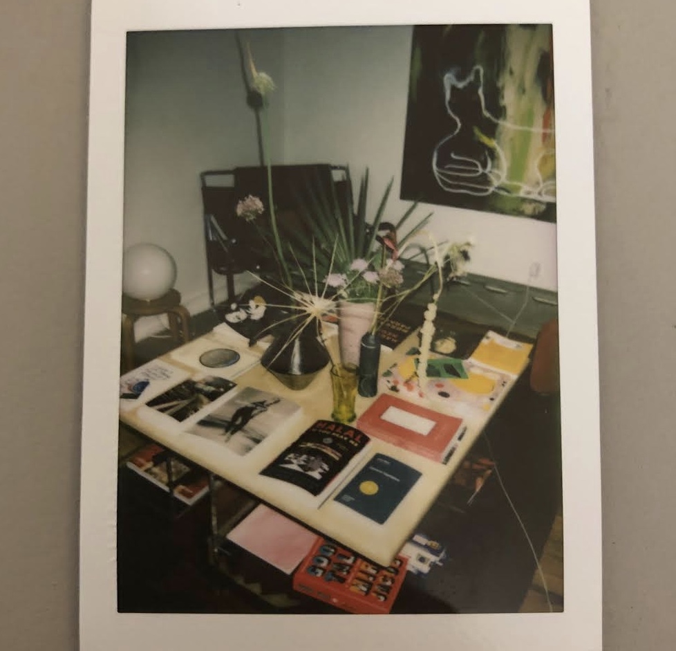 My happy place. When I feel stressed I look at the flowers and books on my table and feel relieved and settled.